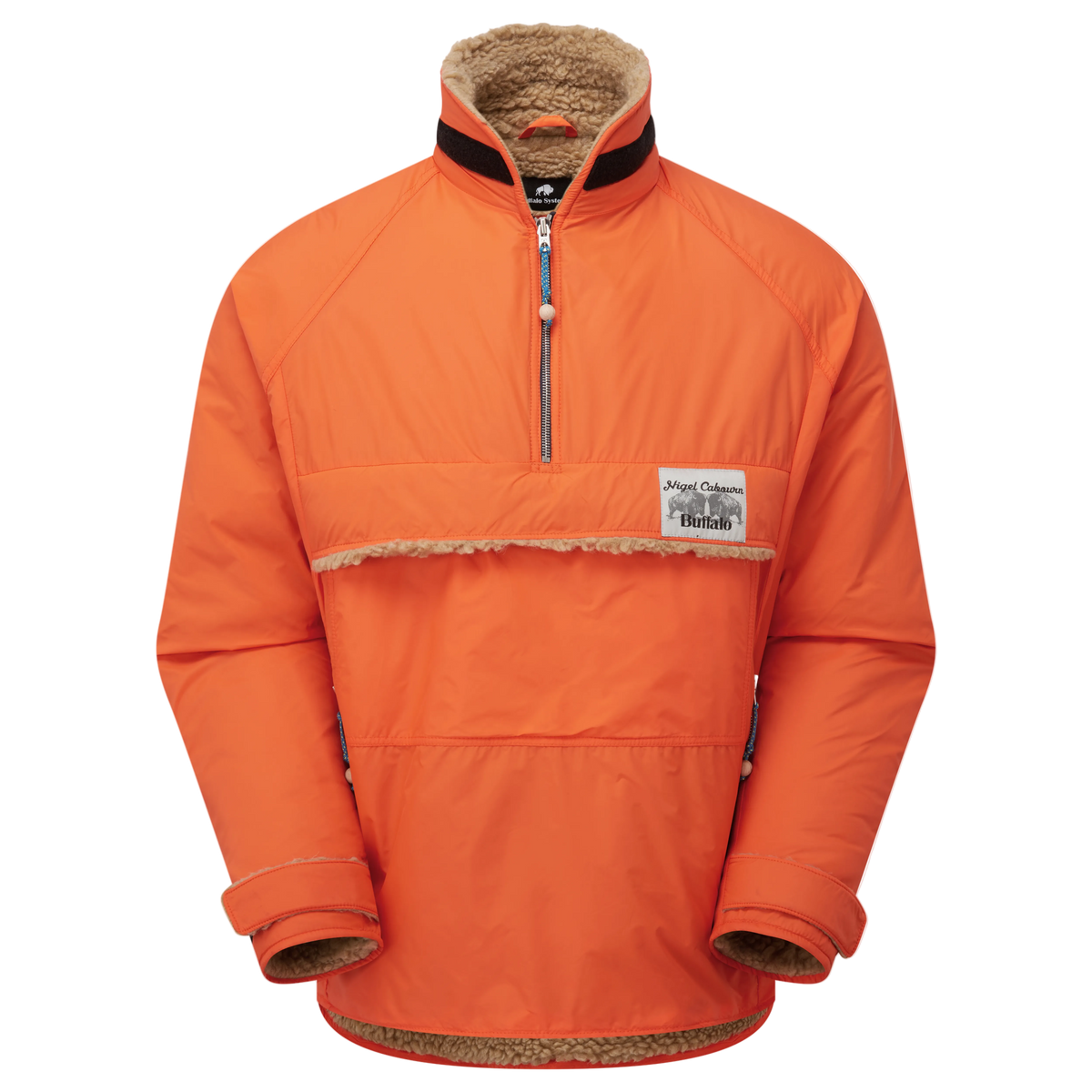 An orange lightweight pullover jacket with a half-zip neckline, a soft brown sherpa lining at the collar and hem, and a white brand patch on the chest pocket.